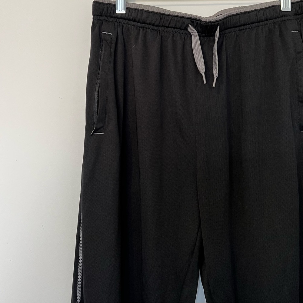 Grey and black sweatpants.